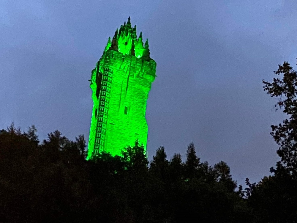 Stirling's Wallace Monument in the darkness lit up green