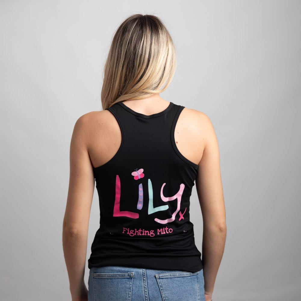 The back of a woman in a black vest featuring the Lily logo and Fighting Mito underneath