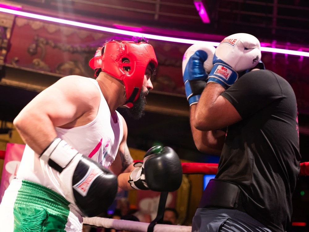 Two boxers face off in the ring at the Clapham Grand