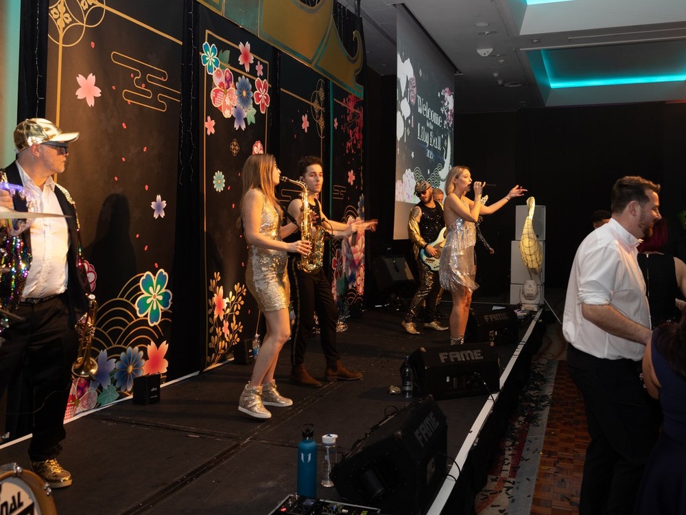Band Fully Funktional playing on stage at the Lily charity ball