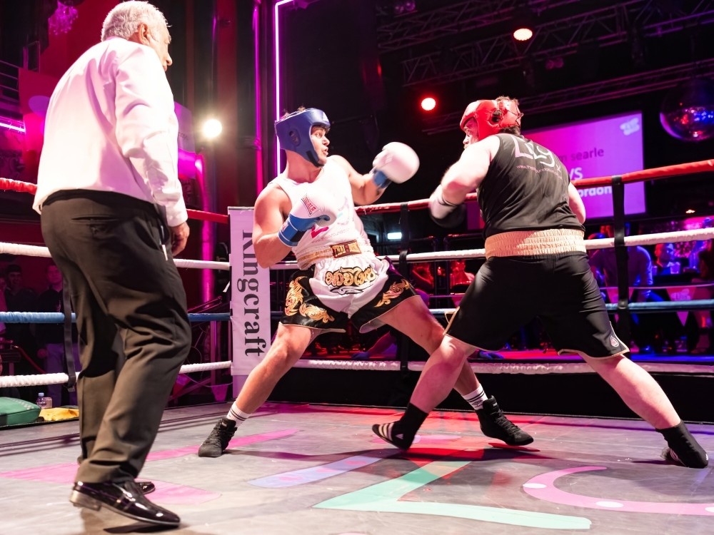Two fighters in the ring at Lily Fight Night