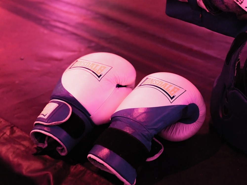 Close-up of a pair of boxing gloves in the ring