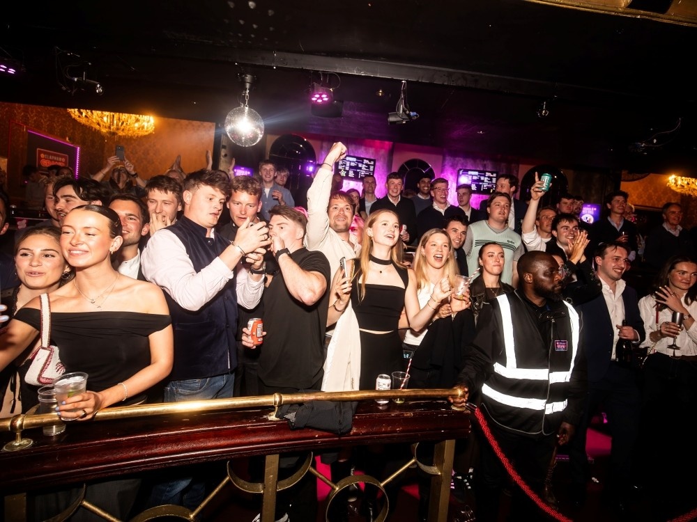 The crowd cheering at the Clapham Grand