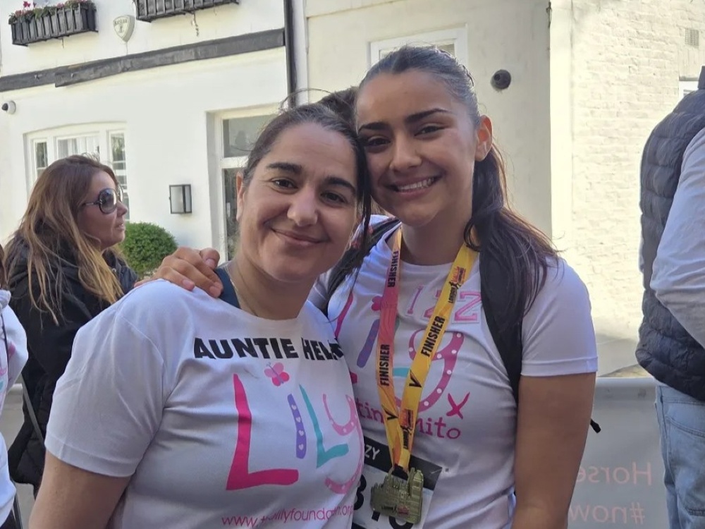 Two women in Lily Foundation tops at the London Landmarks finish line