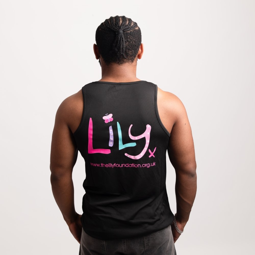 The back of a man in a black vest featuring the Lily Foundation logo and website address.