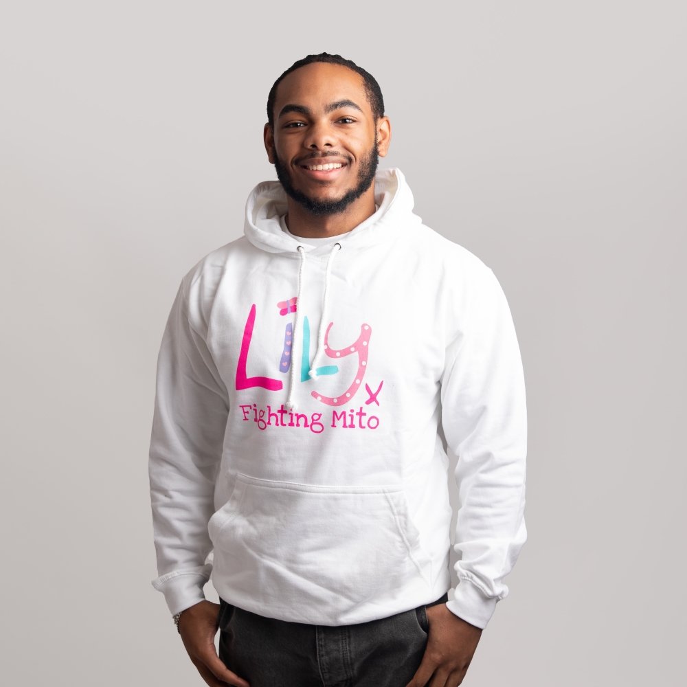 A smiling man in a white hoodie featuring the Lily Foundation logo and the text fighting mito underneath.