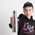 A young boy in a black hoodie holding out a silver water bottle with the Lily Foundation logo