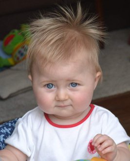 42_dec_2011_in_favourite_car_chair,_getting_ready_for_first_christmas.jpg