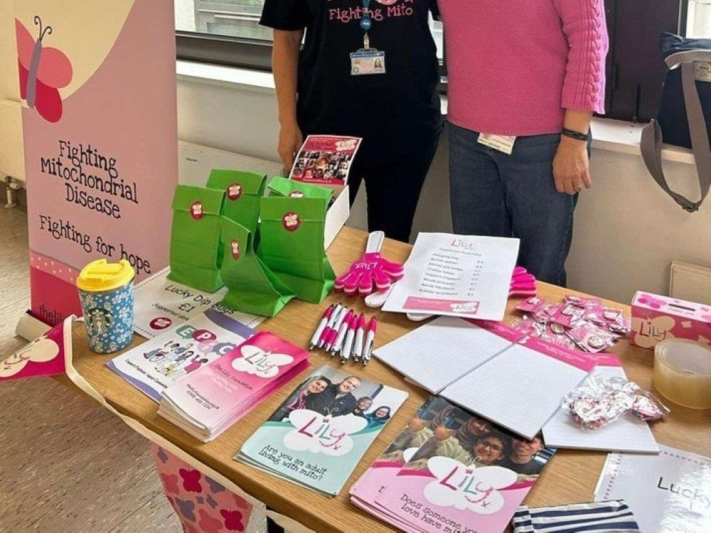 Take A Stand 2025 - A table set up as an awareness stand with Lily Foundation leaflets, balloons and bunting
