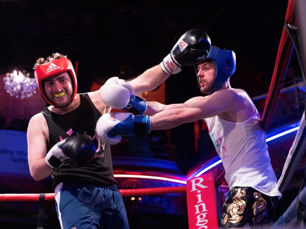 Two Lily boxers at the Clapham Grand fighting in the ring