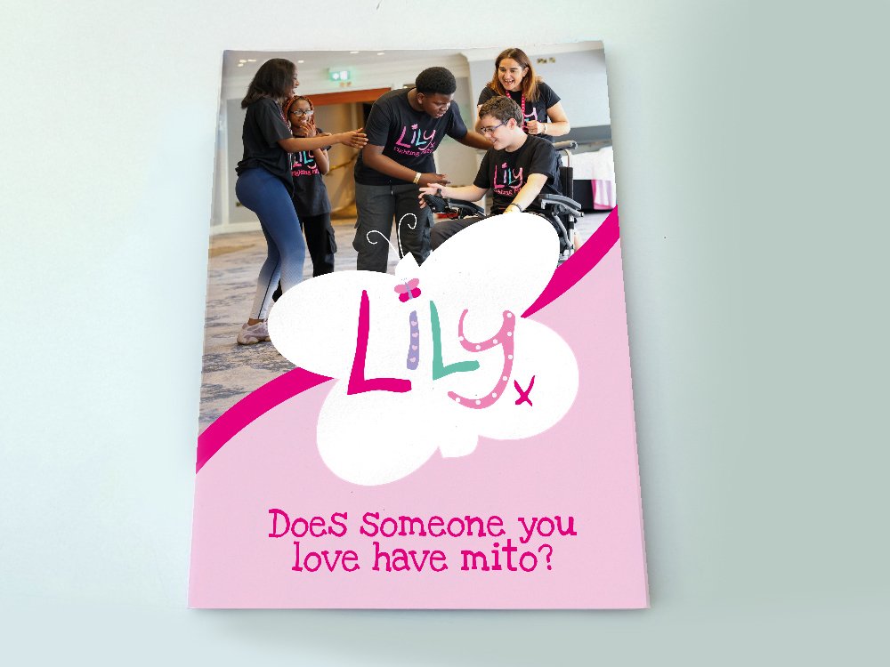 Pink family support pack with large white Lily branded butterfly and mito family with a Lily researcher