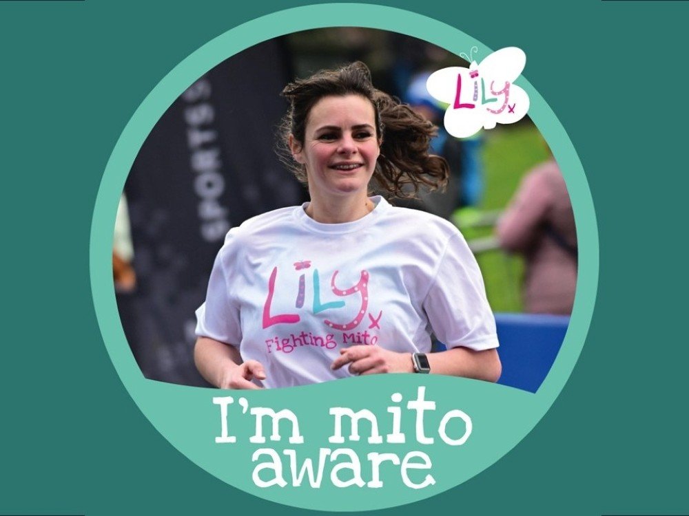 Image of a lady in a Lily Foundation top running inside a Twibbon frame with the words 'I'm mito aware'