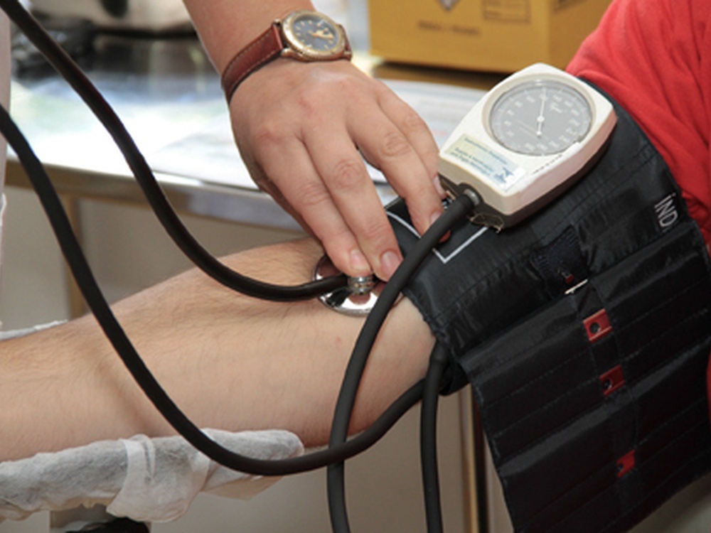 A blood pressure monitor on an arm
