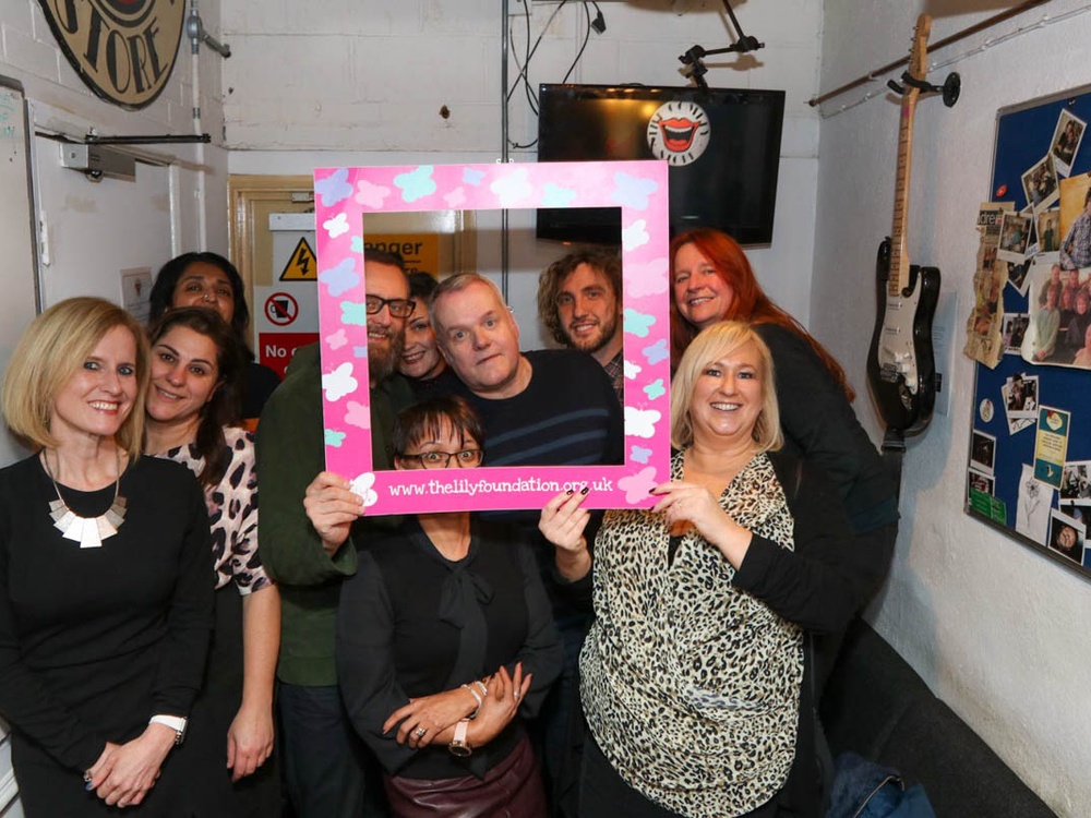 Comedians and Lily staff in the dressing room at the Comedy Store