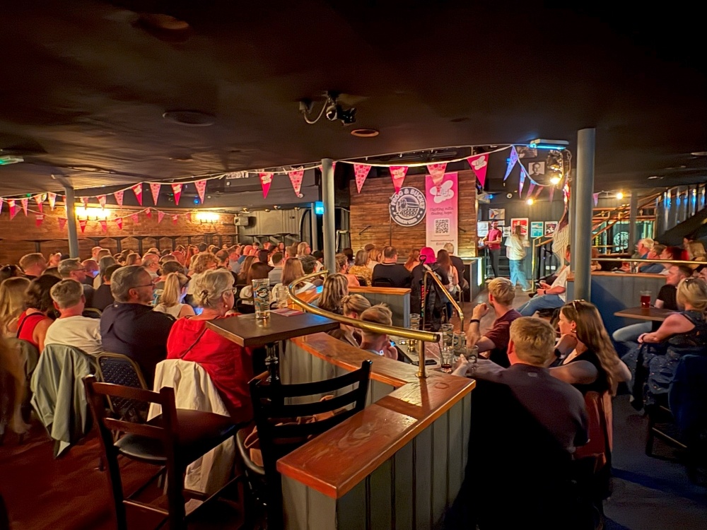 A packed venue at the Frog and Bucket in Manchester for Lily Comedy Night