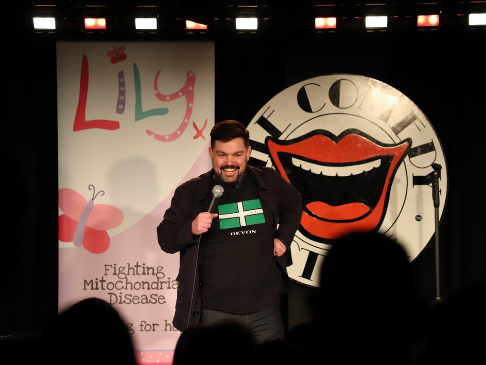 Comedian Charlie Baker on stage at the Lily Comedy Night